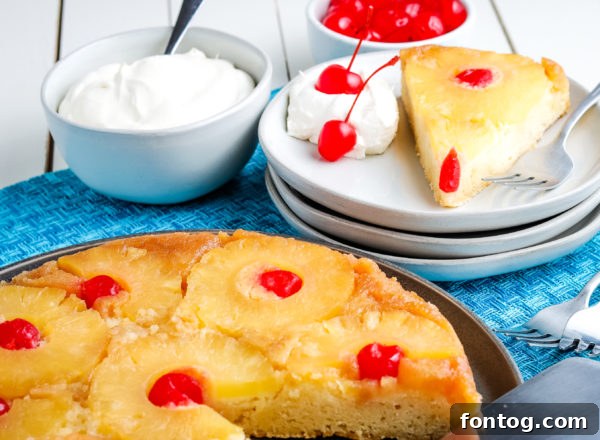 A slice of Gluten-Free Pineapple Upside Down Cake.
