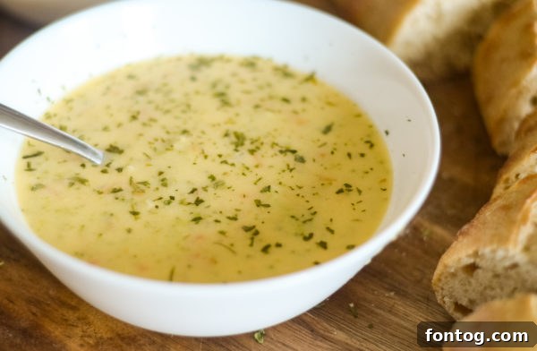 The Ninja Foodi pot with cooked broccoli and carrots, ready for mashing, before dairy is added.