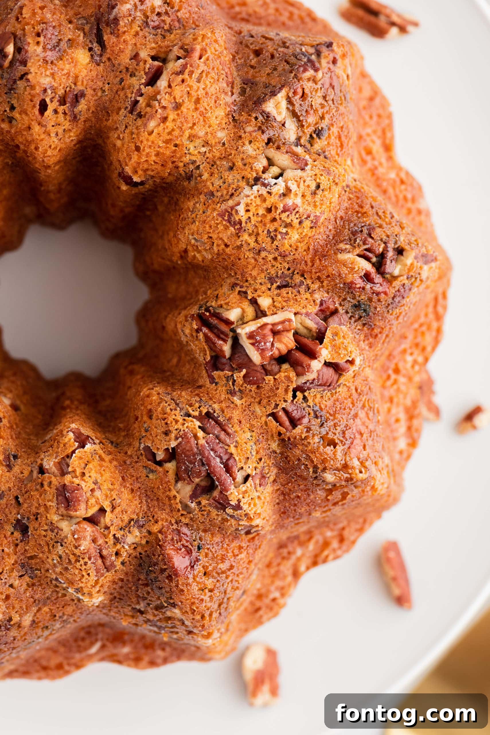 A rich and moist gluten-free pecan rum cake, perfect for special occasions.