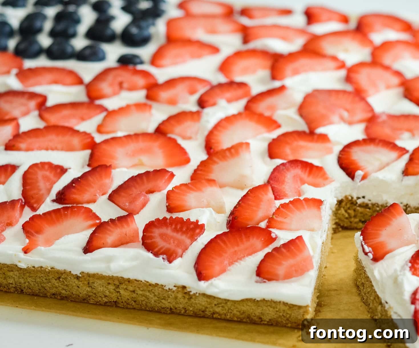 A festive American flag cookie cake with fresh fruit, easily made gluten-free.