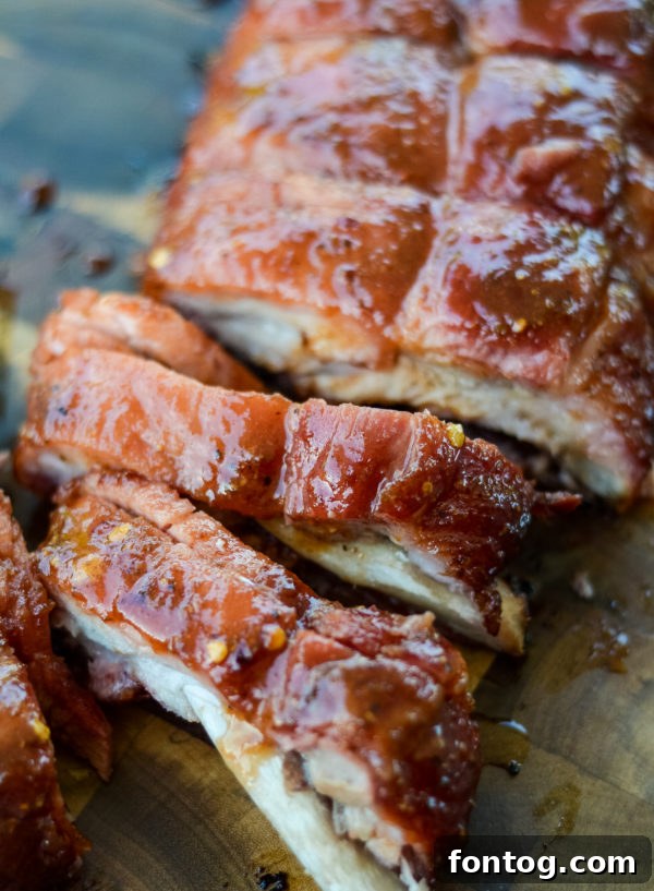 Tips for cooking on the pellet grill: A delicious rack of ribs on the grate.