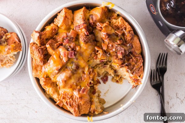 Ninja Foodi Signature Bacon Cheese French Toast 7 Ninja Foodi Bacon Cheese French Toast served with maple syrup, a perfect sweet and savory combination.