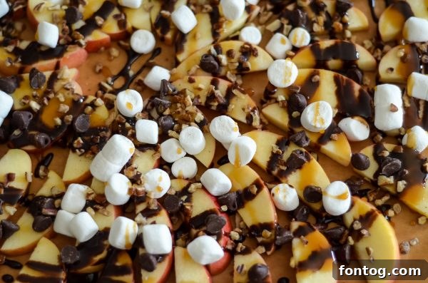 Close-up of apple slices meticulously arranged before topping