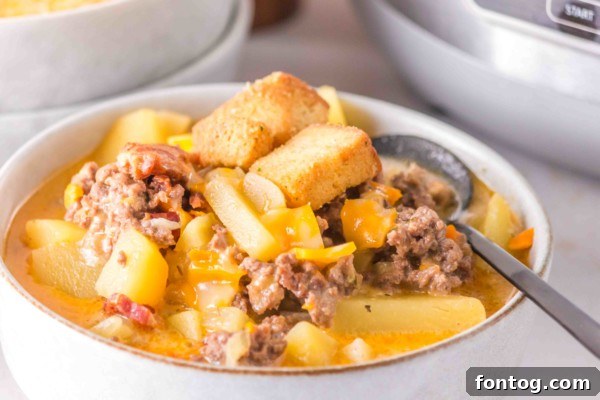 Scooping Gluten-Free Slow Cooker Cheeseburger Soup