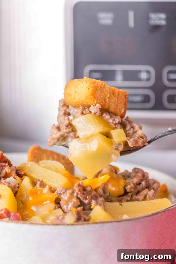 Warm bowl of Gluten-Free Slow Cooker Cheeseburger Soup ready to eat