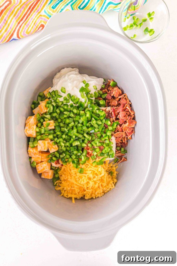 slow cooker jalapeno popper dip in the slow cooker