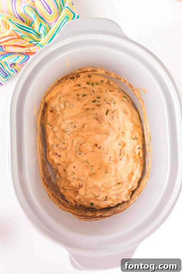 slow cooker jalapeno popper dip in the slow cooker