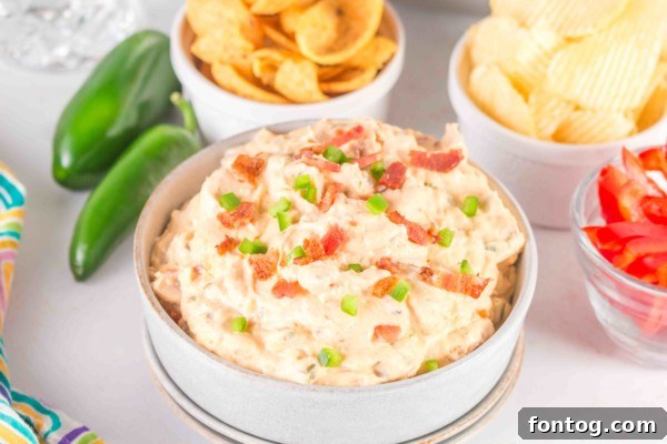 slow cooker jalapeno popper dip in the bowl ready to serve